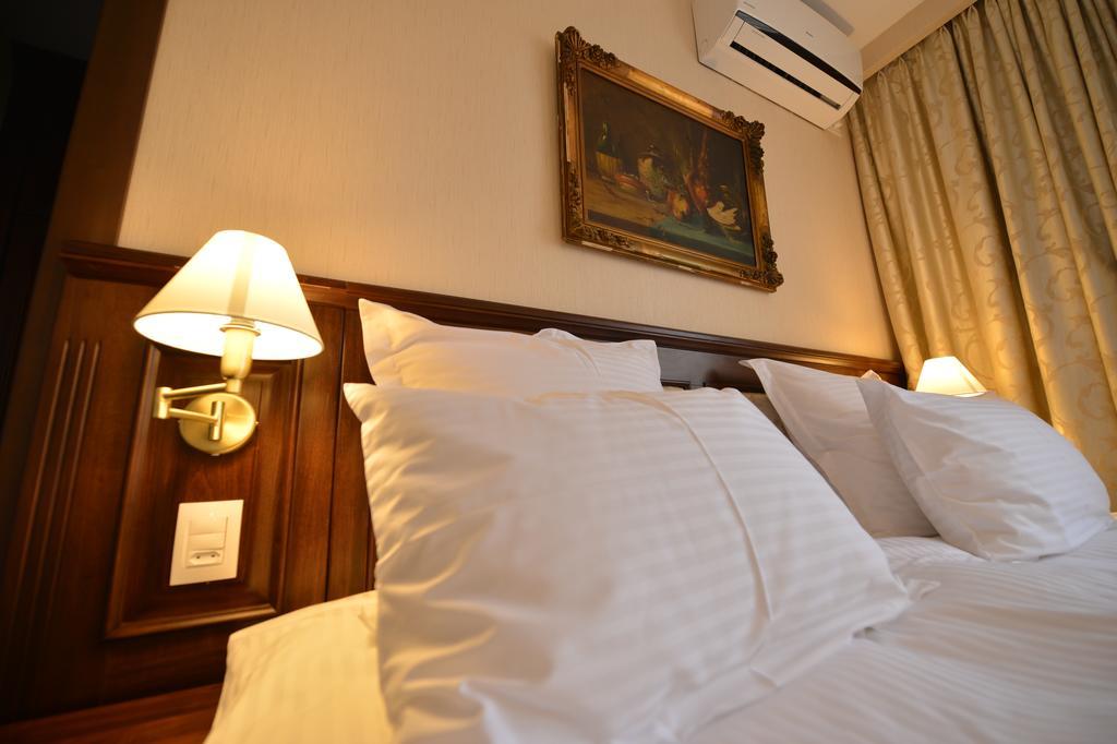 Noblesse Boutique Resort Sibiu Dış mekan fotoğraf A bed